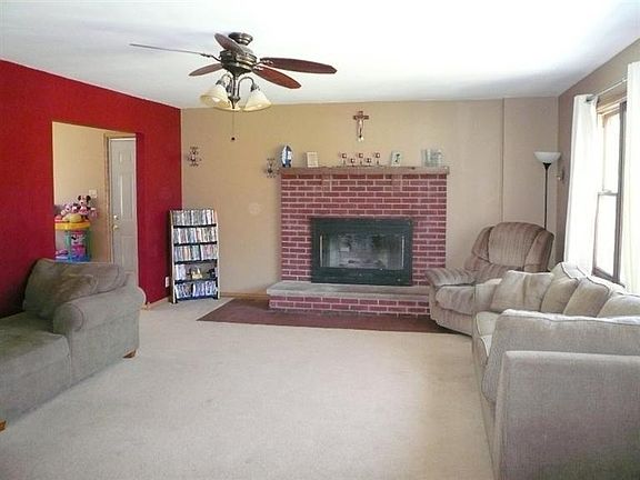 Front living room with gas insert fireplace.