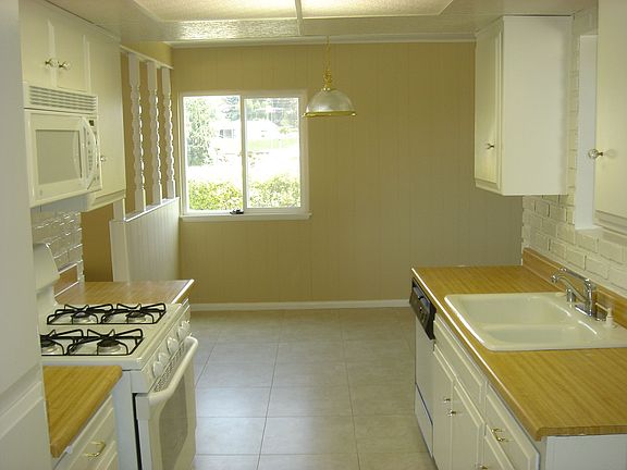New Tile floor, paint, stove and micro!