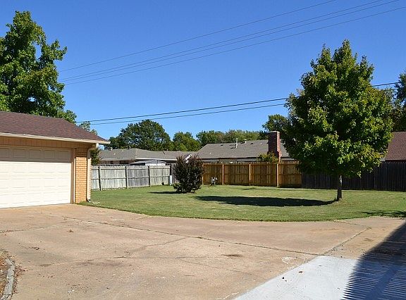Backyard with rear entry garage