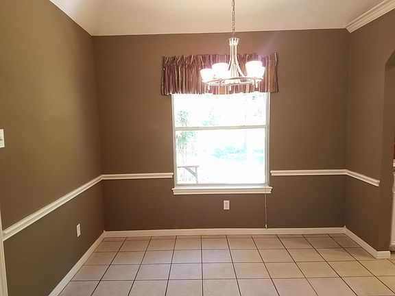 Dining area with view of back yard