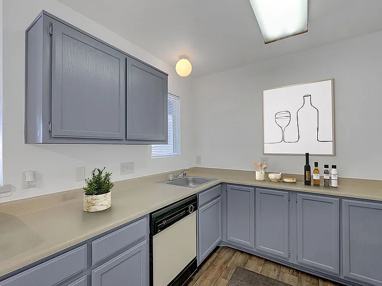 Experience the elegance of this modern kitchen, combining style and functionality.