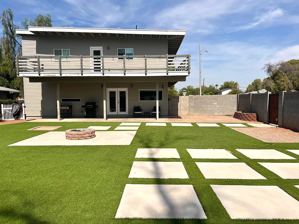 Professionally designed backyard with low maintenance artificial turf, fire pit, and back patio - 1136 S Roosevelt St