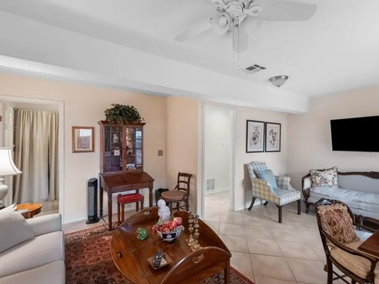 Ground level 2nd living or 3rd bedroom. Access to outdoor patio, Private full bathroom.