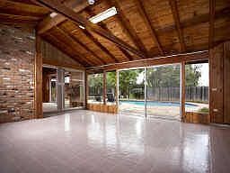 Huge Family room opens to the in-ground pool.