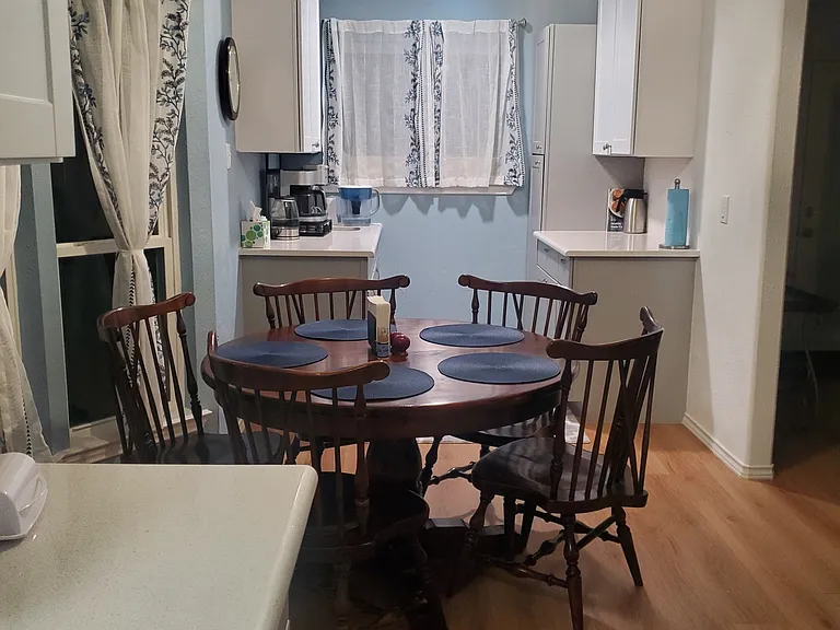 Kitchen eating area, coffee bar and storage for tenants' food items.