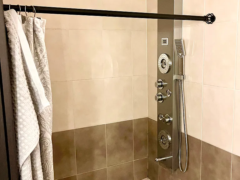 Bathroom #3 w/ luxury rain shower, hand shower, body sprays, and tub