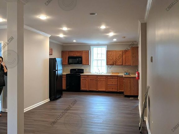 Updated kitchen with plenty of cabinet space.