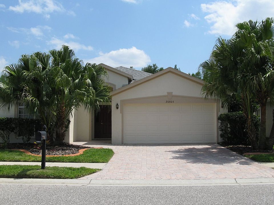 Front- Paved stone driveway