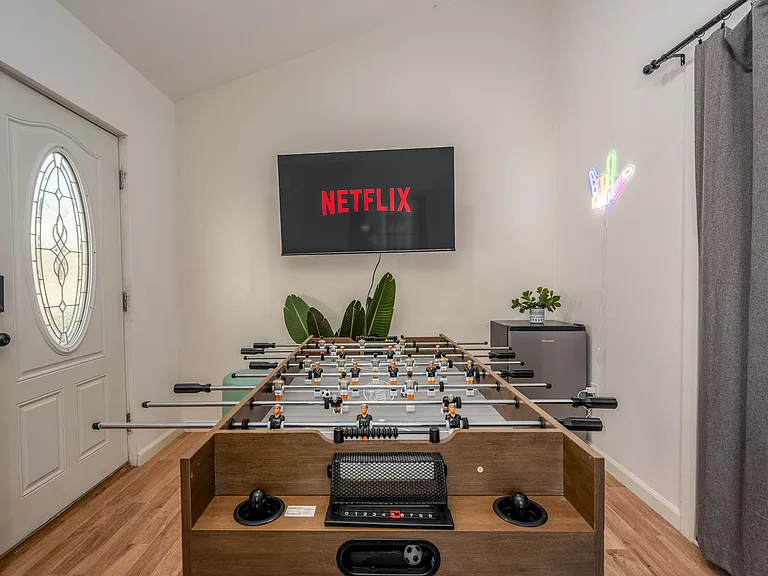Ultimate entertainment and relaxation zone _ a versatile game room in the main house that doubles as a 2nd living space.