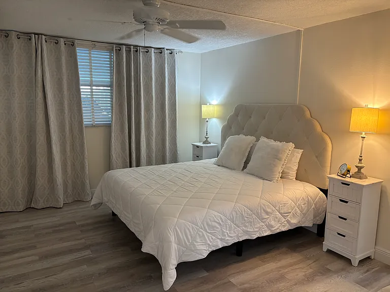 Primary bedroom - king size bed with recliner