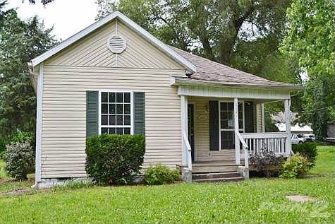 So come on in and take a peek at this "feels larger than it is" house.