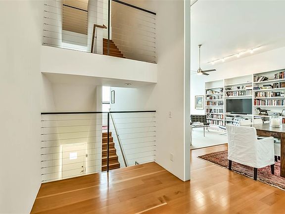 Open stairs are integrated into the modern design.