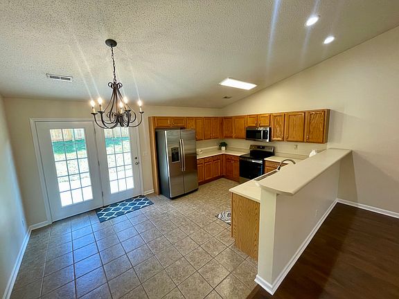 Kitchen/ Dining with large Bar area for entertaining