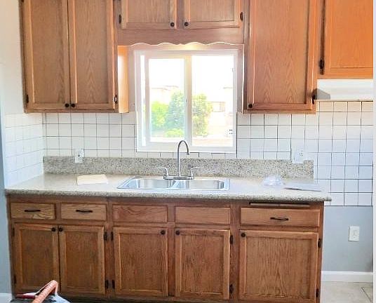 Kitchen (Note: There's another window on right side wall. Ni