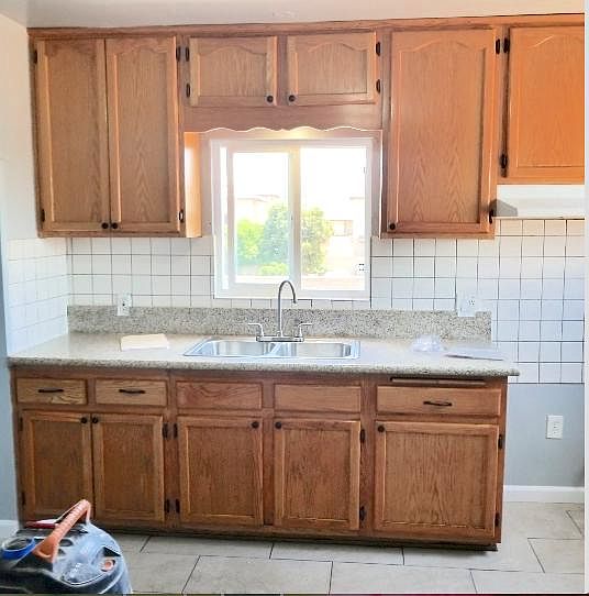 Kitchen (Note: There's another window on right side wall. Ni