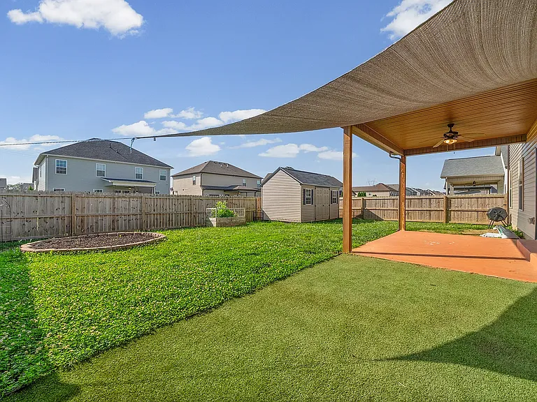 Large circle pit for trampoline or seating area.
