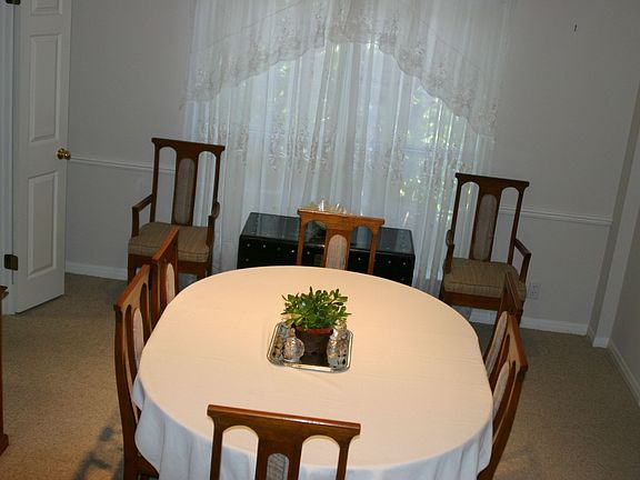 Formal dining offers privacy from kitchen and formal living