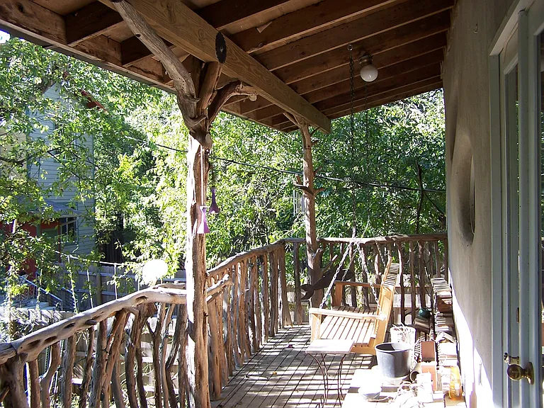 Front porch with cypress bench swing