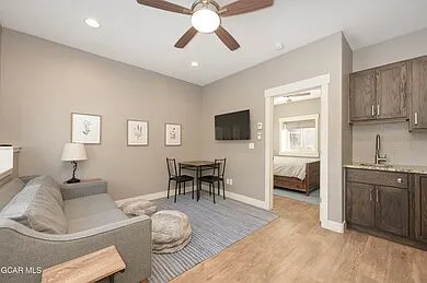 Living area and entry to bedroom