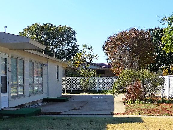 Front porch with landscape.