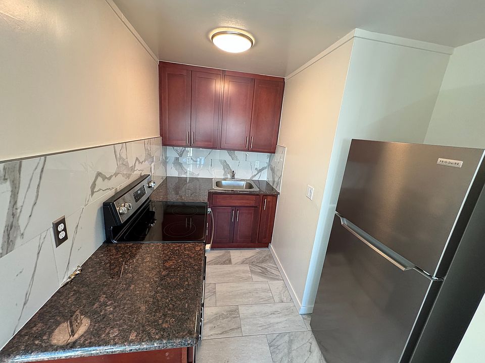 Remodeled kitchen with brand-new refrigerator