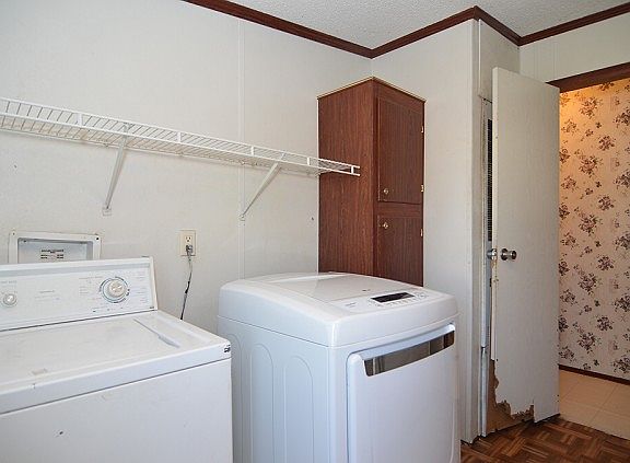 Large laundry with shelving