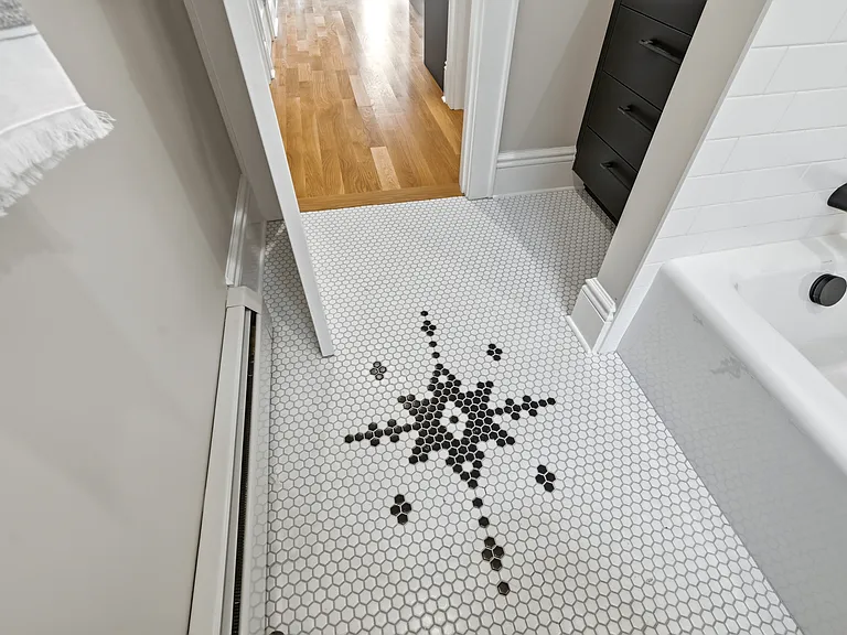 The designer tiling in the brand new bathroom sparkles in your new oasis. It's all in the details!
