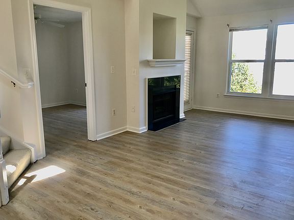 Living Room, Fireplace, Door to Balcony, Door to Bedroom
