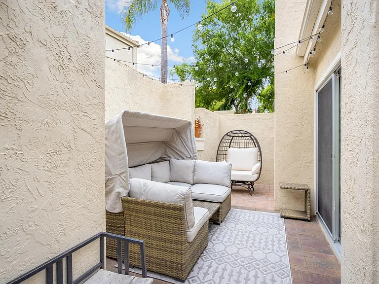 Embrace indoor-outdoor living with cozy patio just steps away from living room