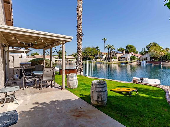 Back patio with lakefront rights.