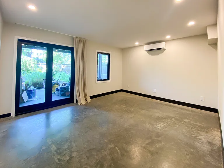 Polished concrete floors with radiant floor heating, split units for AC