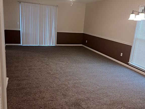 View of Living Room from Foyer... all new carpet.
