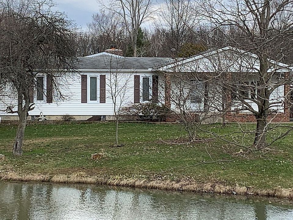 Front porch view to stocked 