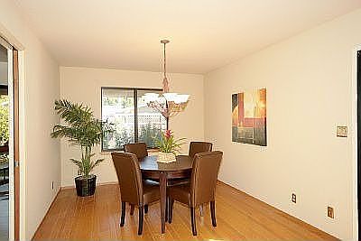Formal Dining Area looks out to Rose garden on the south