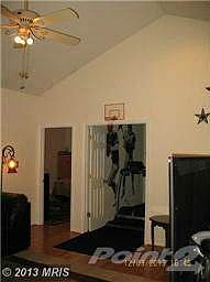 5 Living Room - view to MBR and Den