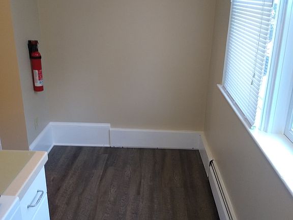 Kitchen a spot for a small table.
4 windows in the Kitchen.