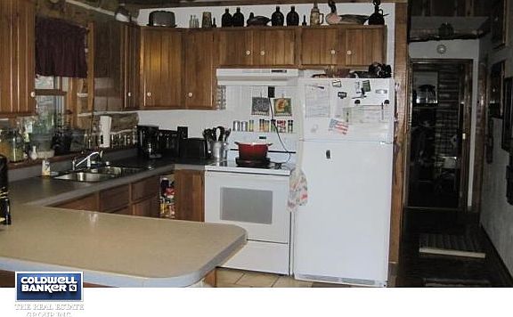 Kitchen area of log cabin