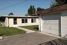 Fenced yard with driveway