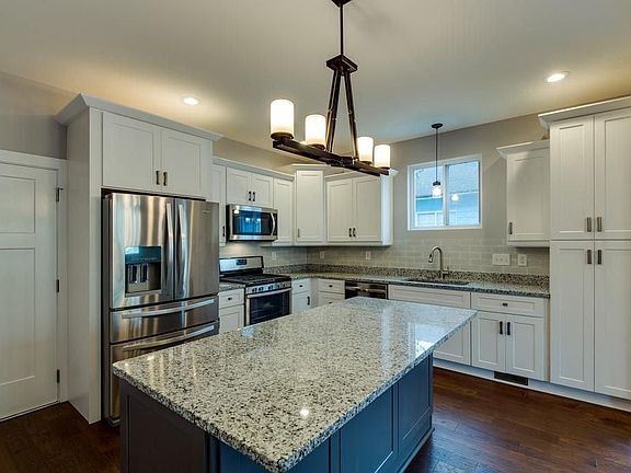 Stainless steel appliances and soft-close cabinets