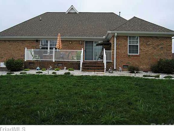 Rear of Home with Patio for Outdoor Enjoyment!