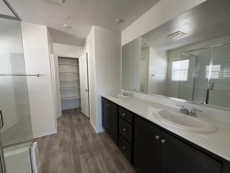 Master bath double sink and linen closet