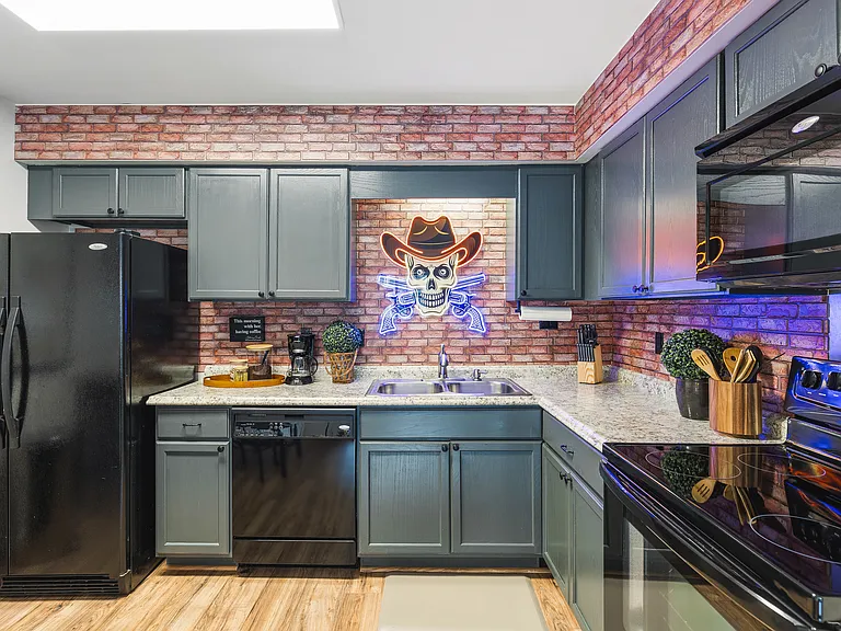 Fully equipped kitchen for all of your cooking needs! Dining table with seating for 4.
