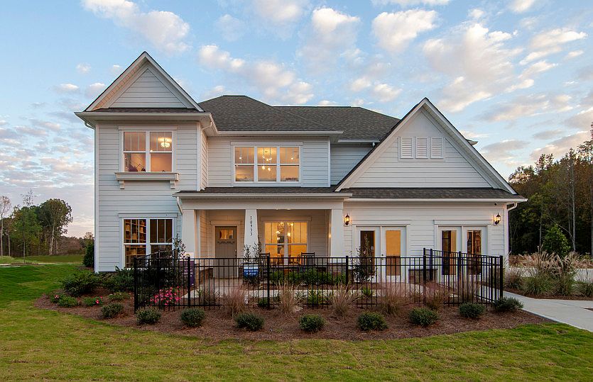 Wingate exterior 62 features siding, stone accents, covered front porch, and 2 car garage