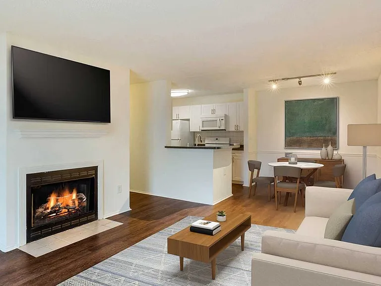 Classic Package kitchen, living, and dining areas with hard surface plank flooring