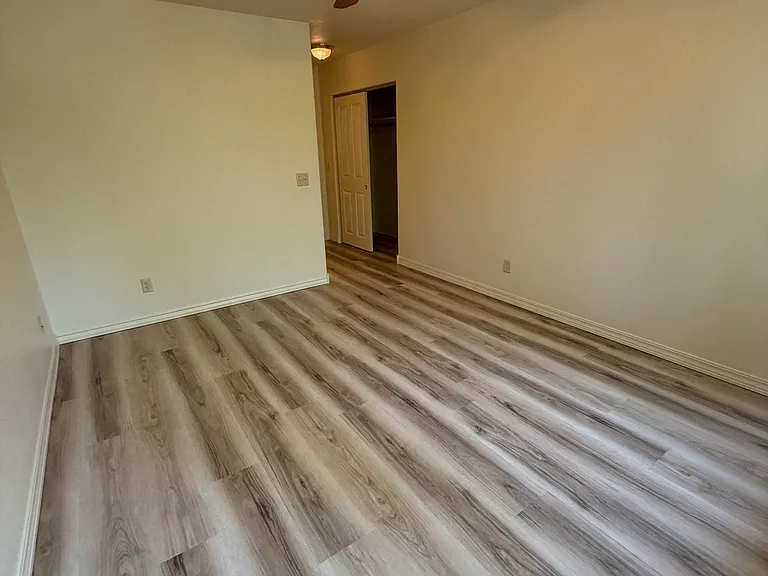 Master bedroom, with ceiling fan.