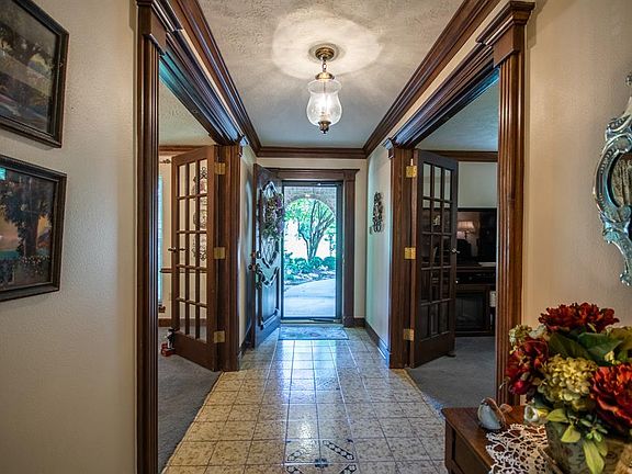 Upon Entry you have the formal living and office/study that flank the front door.