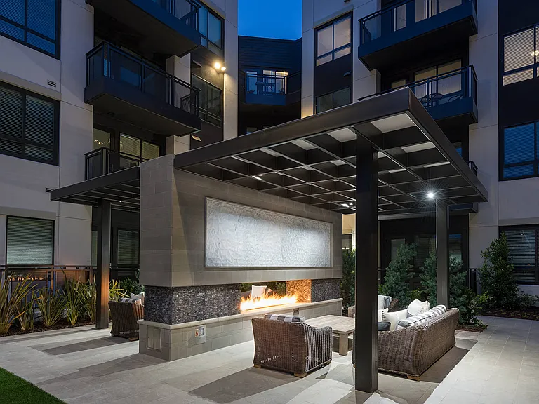 Double-sided outdoor fireplace for double the guest count