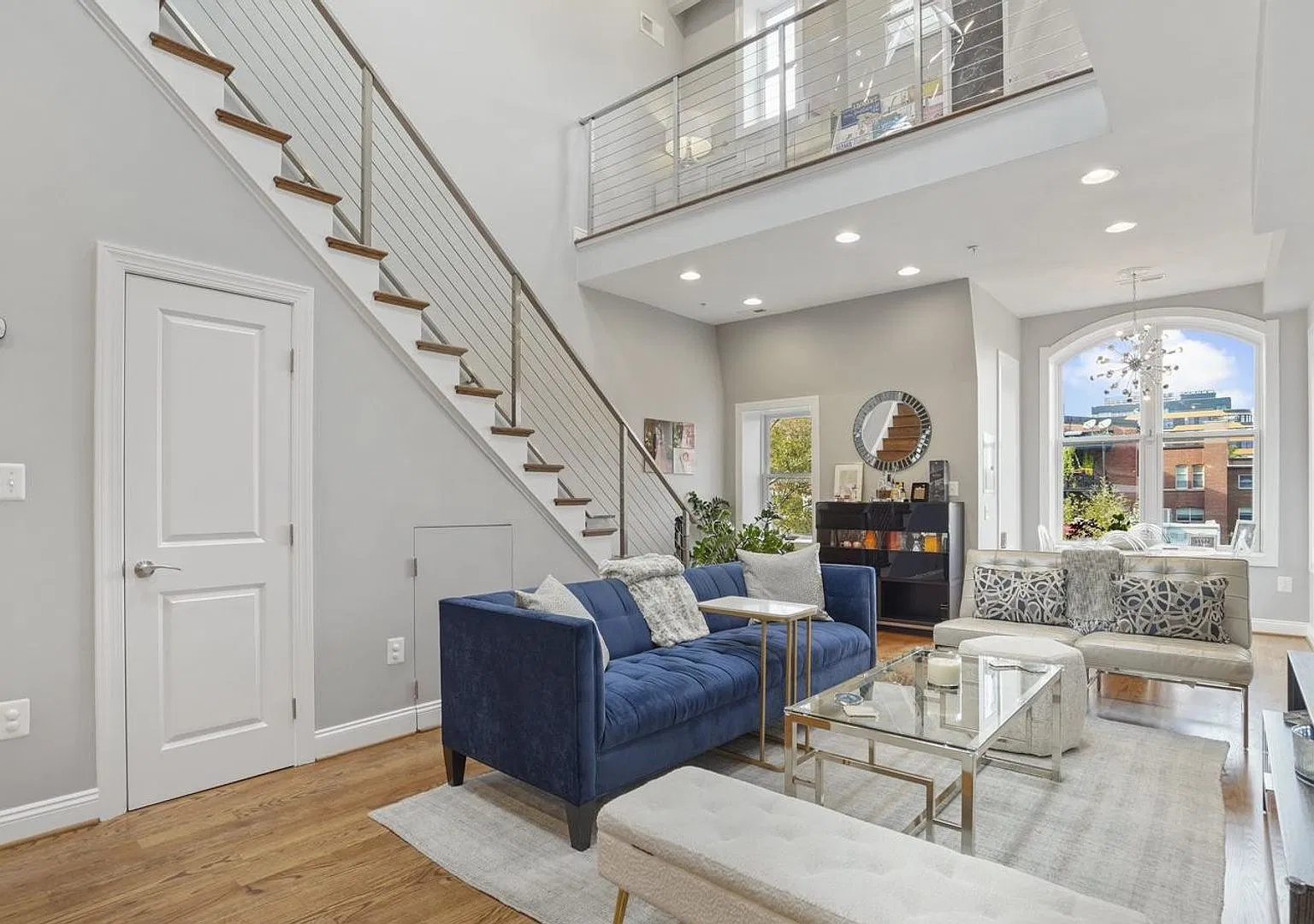 Stunning 3-bedroom, 2.5-bath two-level penthouse with den in historic Shaw, featuring soaring cei... — Photo 2