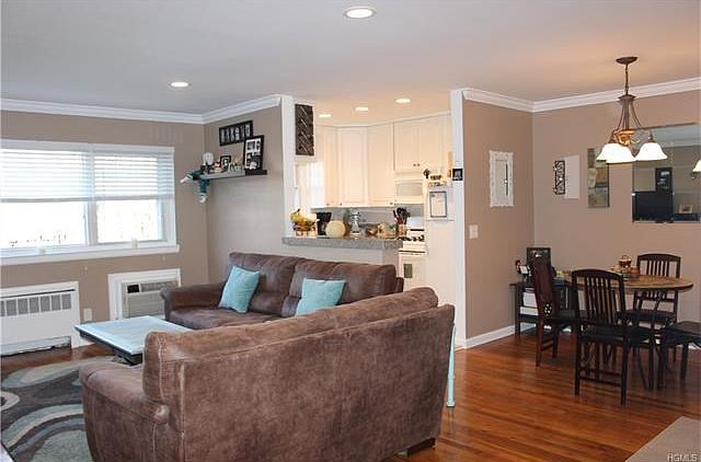 Living room, dining room, and kitchen.