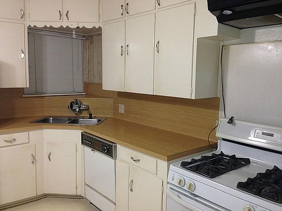 Kitchen Includes gas stove and fridge